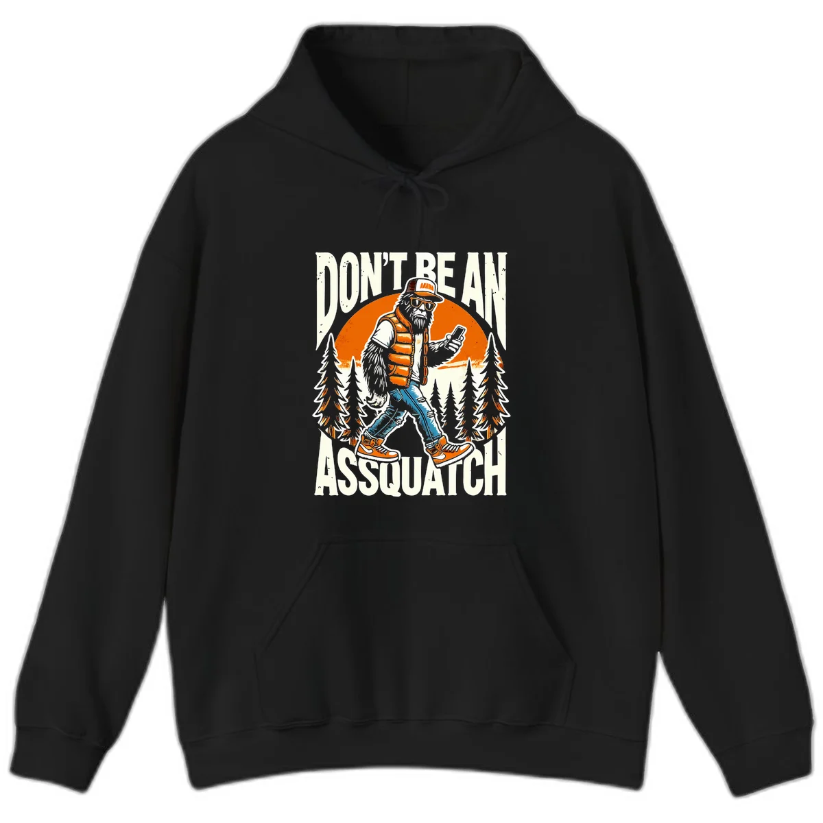 Cartoon sasquatch in hiking gear with backpack and smartphone, 'Don't Be An Assquatch' text, forest and orange sun background. in Black
