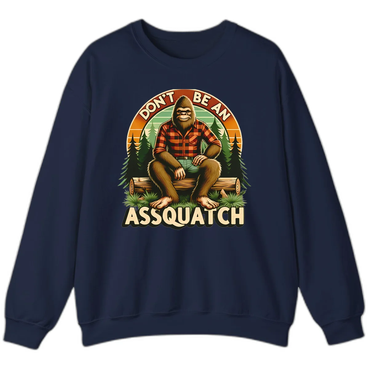 Vintage badge design with friendly Bigfoot in plaid shirt sitting on a log with forest trees, text reads 'Don't Be An Assquatch' in Navy