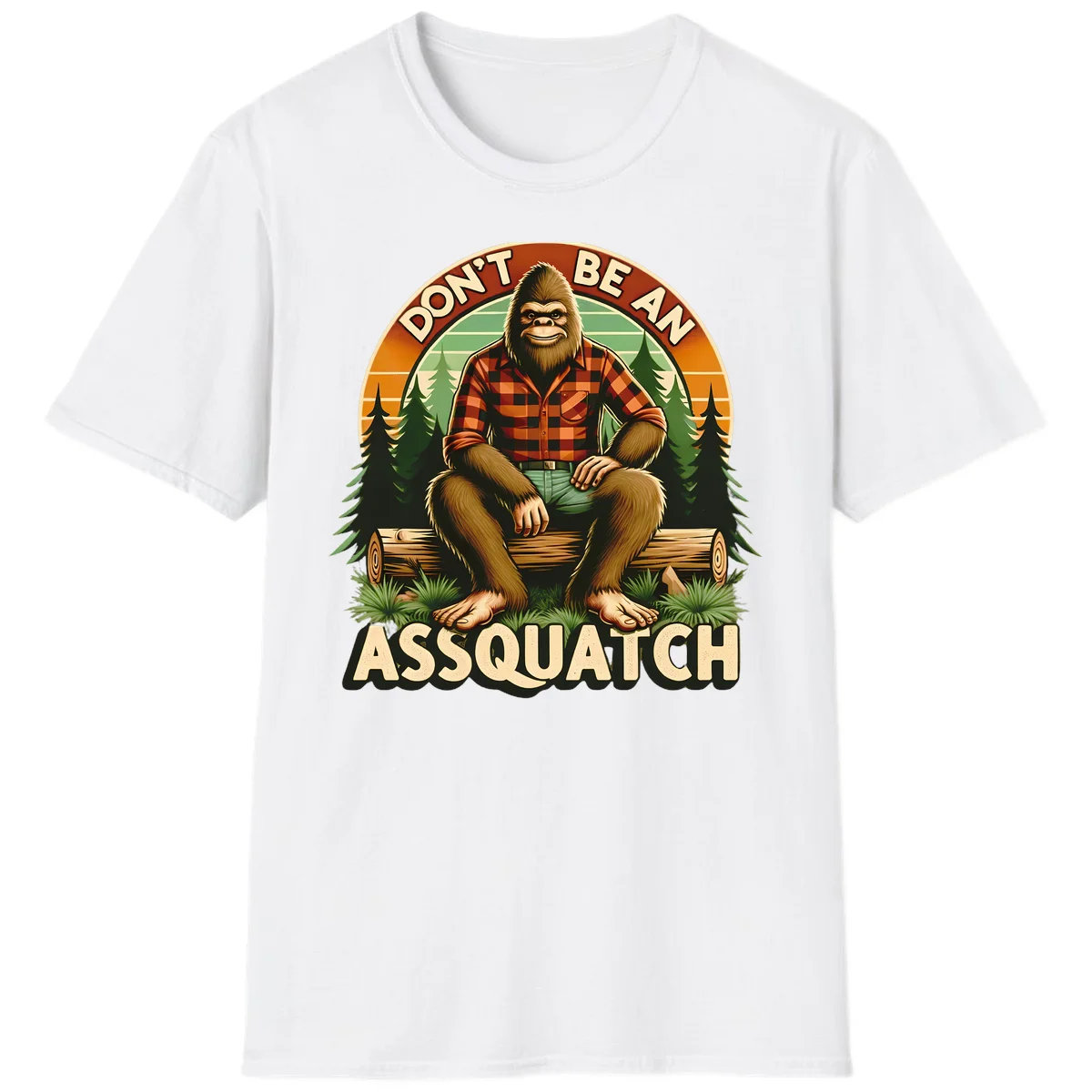 Vintage badge design with friendly Bigfoot in plaid shirt sitting on a log with forest trees, text reads 'Don't Be An Assquatch' in White
