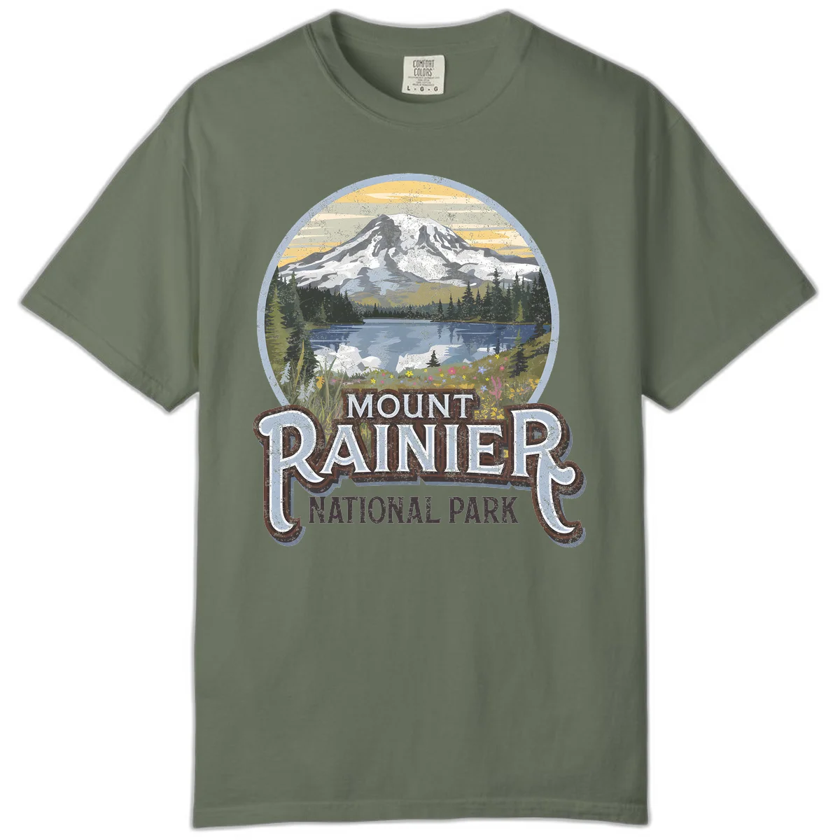 Vintage Mount Rainier National Park badge design with snow-capped peak, alpine lake, evergreen forest, and wildflowers on distressed background in Moss