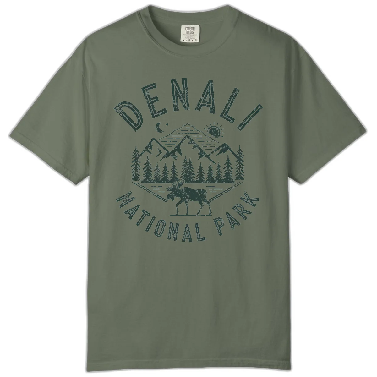 Denial National Park badge design with moose walking through forest, mountains, sun and moon with crossed fishing rods in Moss