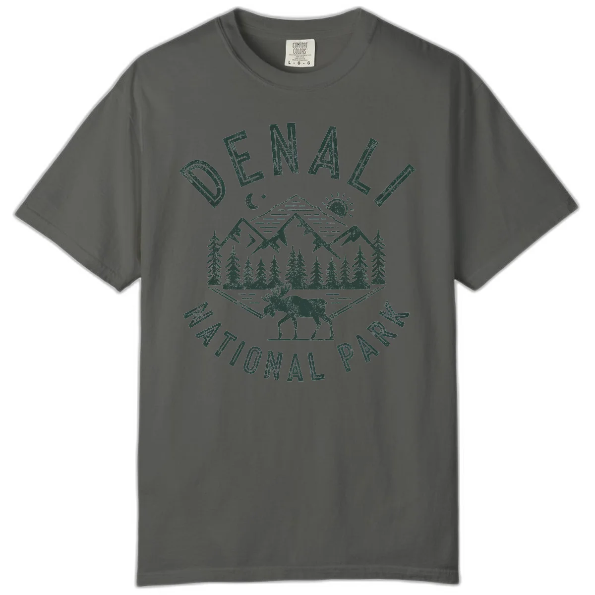 Denial National Park badge design with moose walking through forest, mountains, sun and moon with crossed fishing rods in Pepper