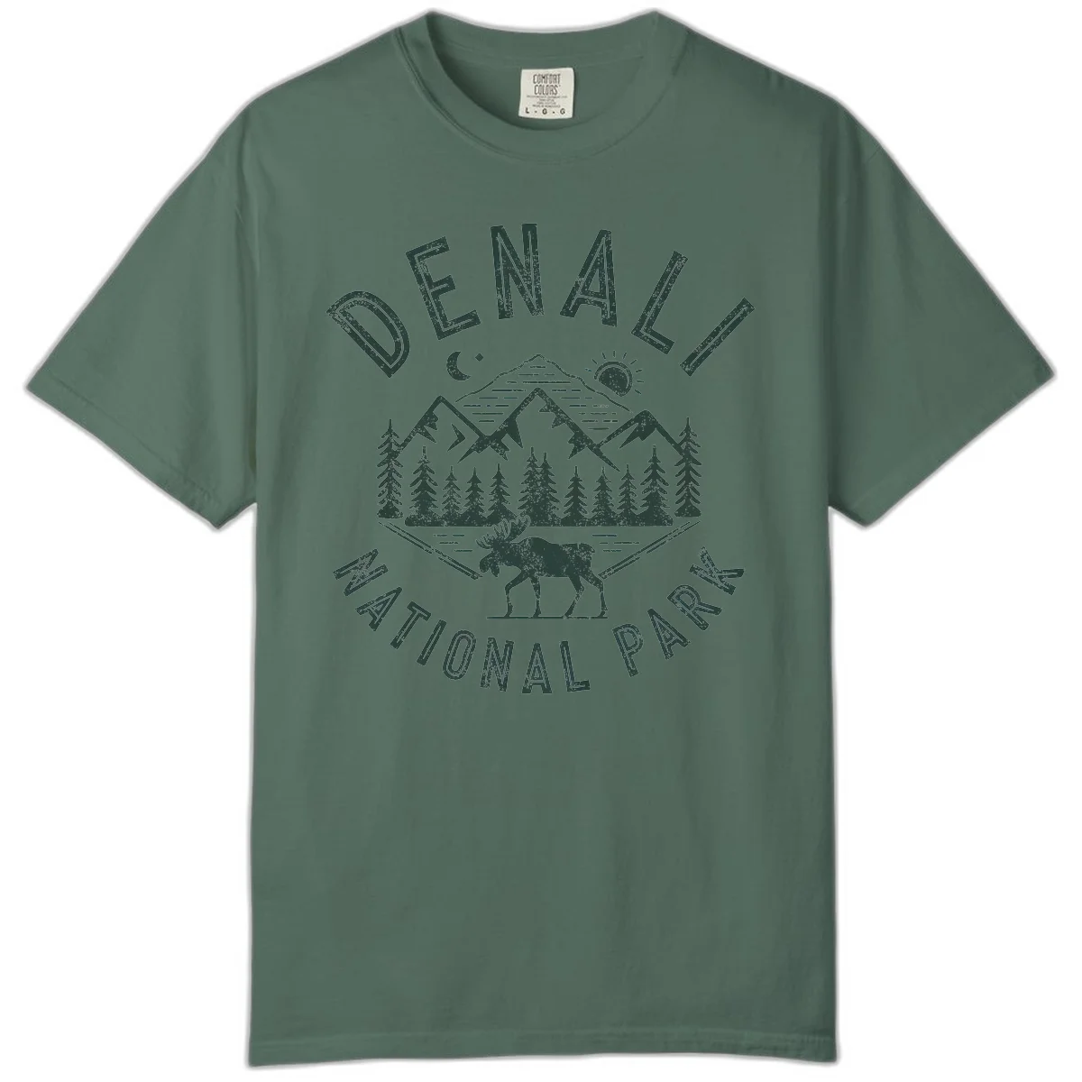 Denial National Park badge design with moose walking through forest, mountains, sun and moon with crossed fishing rods in Blue Spruce