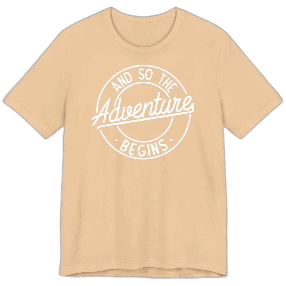 Vintage circular badge design with white text reading 'And So The Adventure Begins' on gray background in Sand Dune