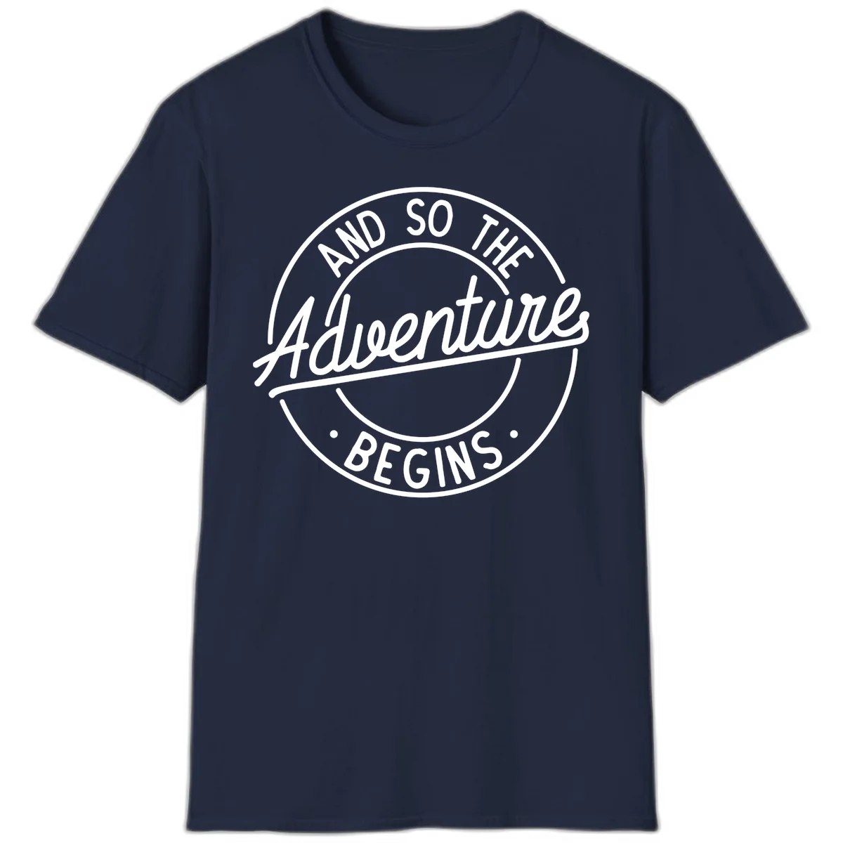 Vintage circular badge design with white text reading 'And So The Adventure Begins' on gray background in Navy