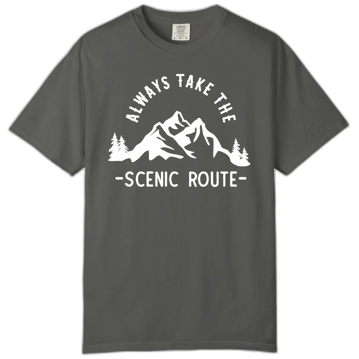 Mountain landscape with evergreen trees and text reading 'Always Take The Scenic Route' in bold lettering in Pepper
