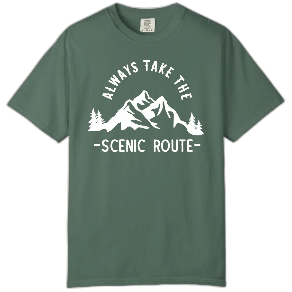 Mountain landscape with evergreen trees and text reading 'Always Take The Scenic Route' in bold lettering in Blue Spruce