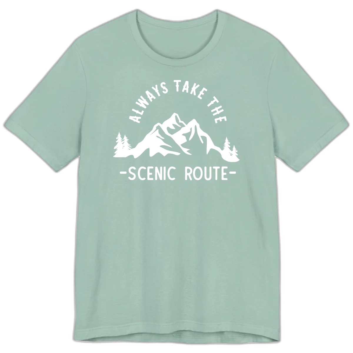 Mountain landscape with evergreen trees and text reading 'Always Take The Scenic Route' in bold lettering in Dusty Blue
