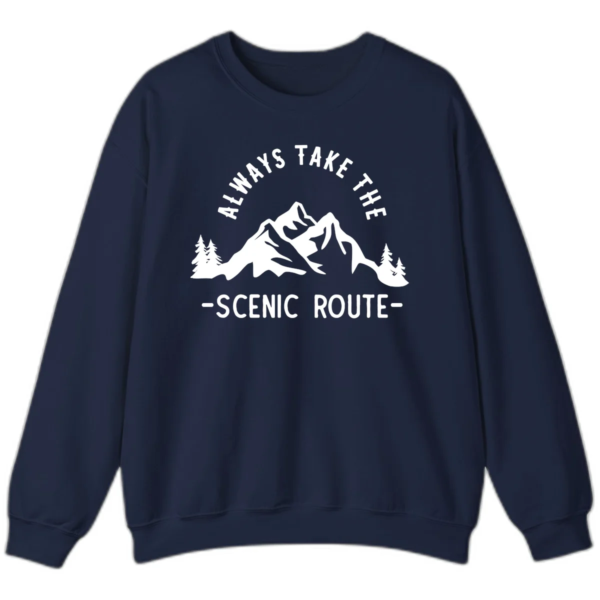 Mountain landscape with evergreen trees and text reading 'Always Take The Scenic Route' in bold lettering in Navy