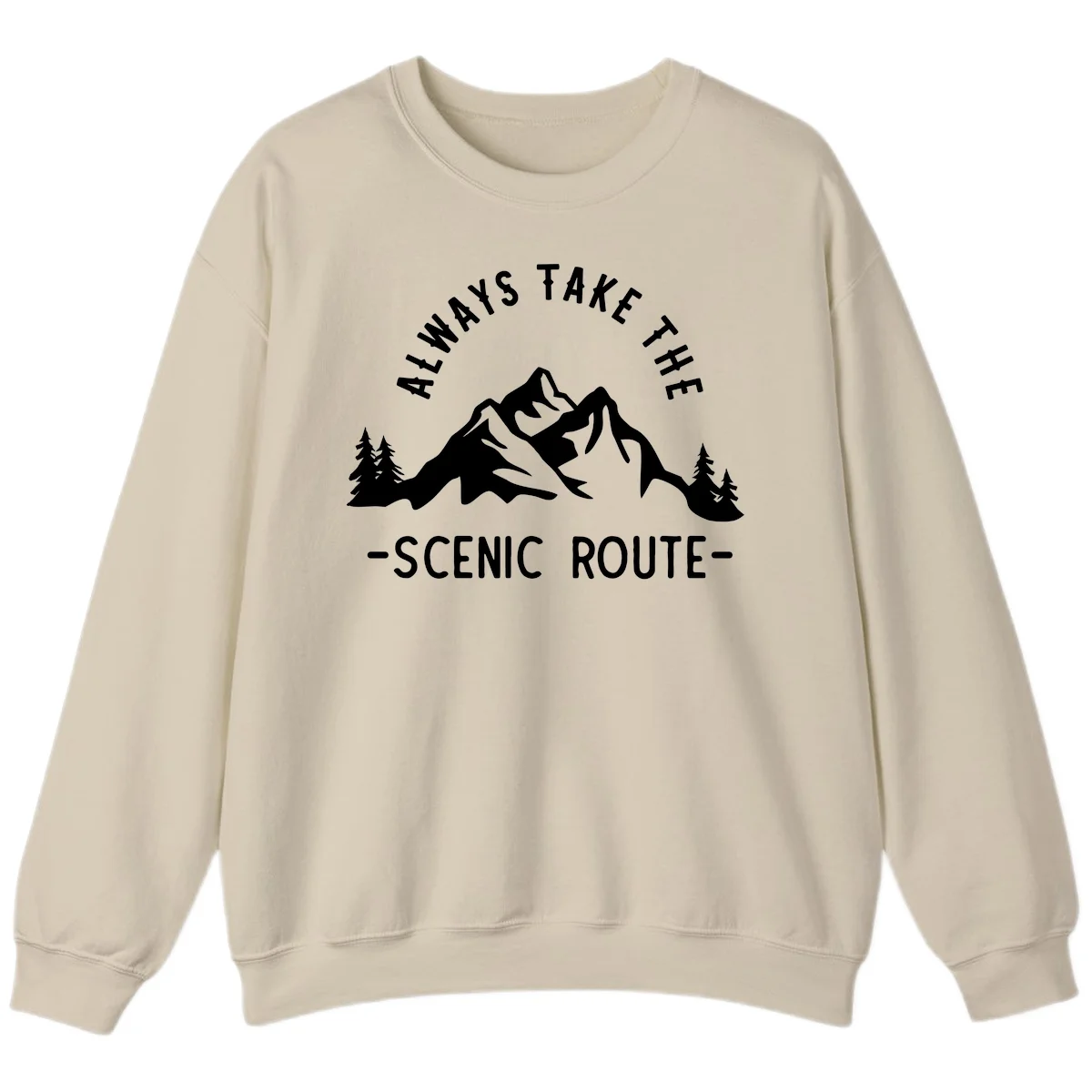 Mountain landscape with evergreen trees and text reading 'Always Take The Scenic Route' in bold lettering in Sand