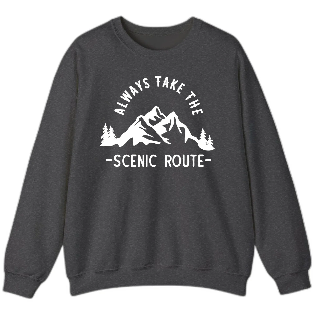 Mountain landscape with evergreen trees and text reading 'Always Take The Scenic Route' in bold lettering in Dark Heather