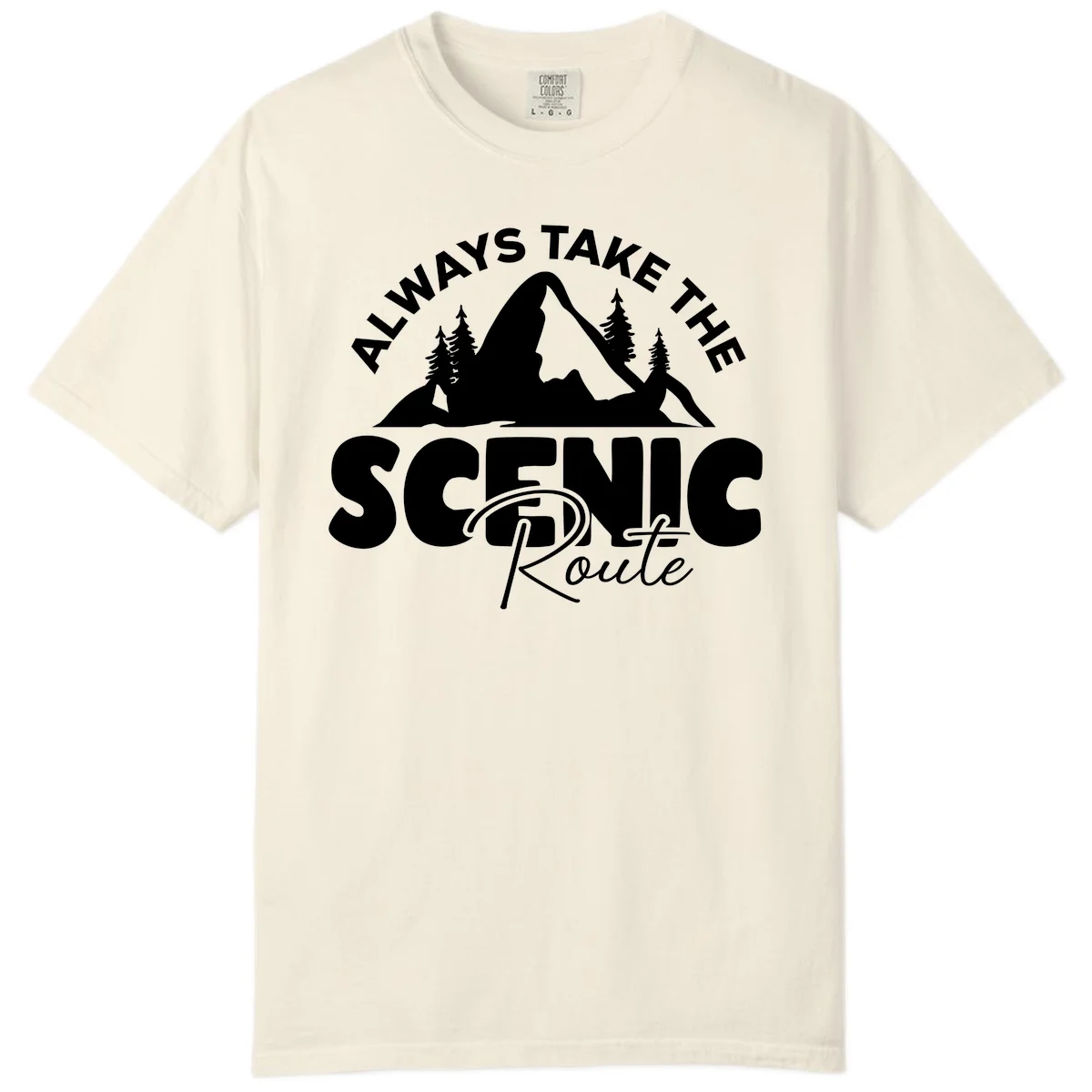 White mountain landscape illustration with evergreen trees and text reading 'All Ways Take The Scenic Route' on gray background in Ivory