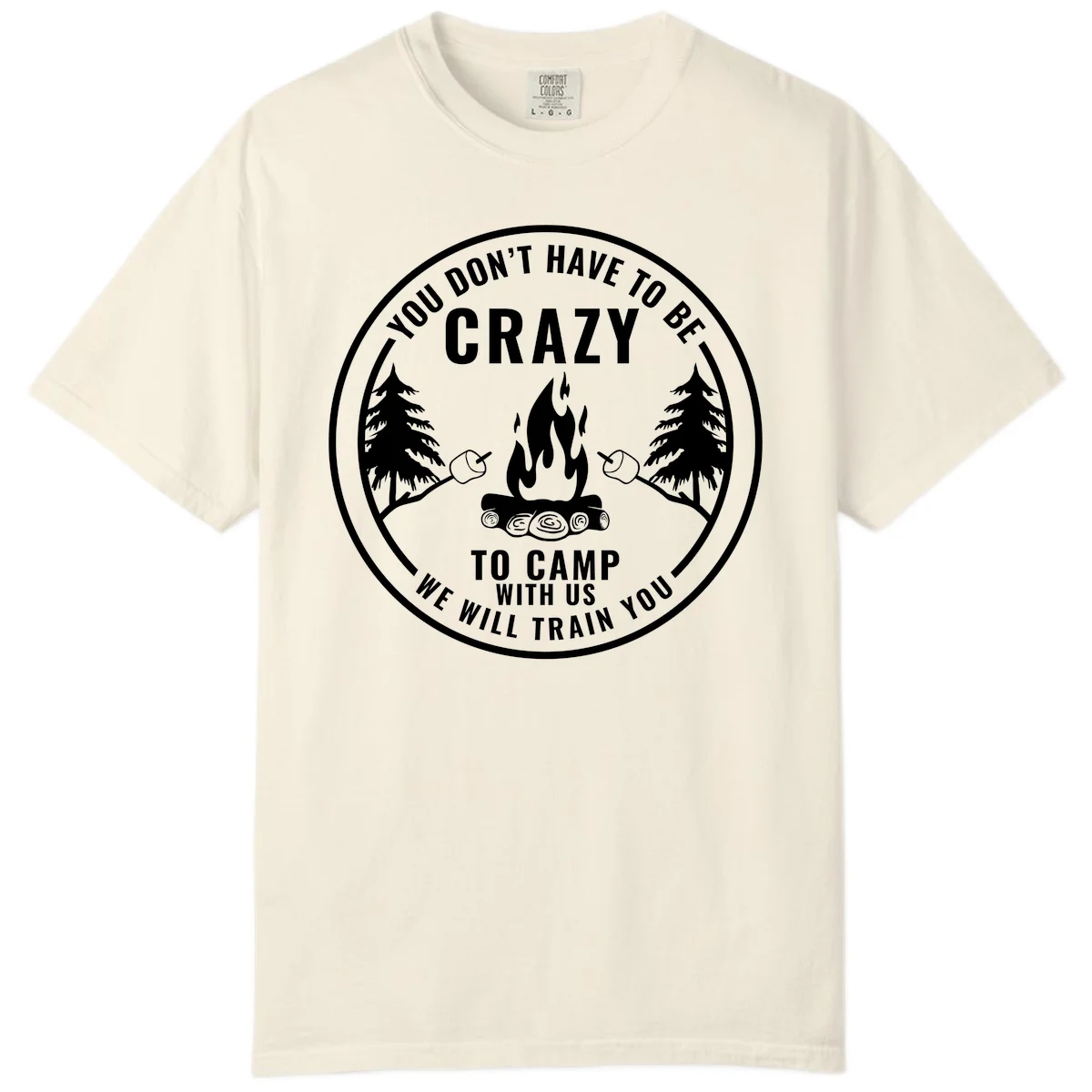 Circular badge design with campfire, pine trees, and marshmallows on sticks with humorous camping text about training crazy campers in Ivory