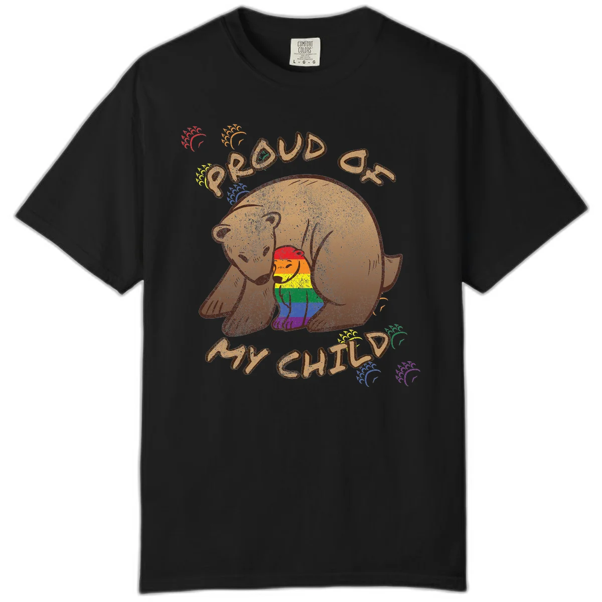 Brown bear proudly displaying rainbow pride colors with 'Proud As Shit' text and decorative bursts in Black