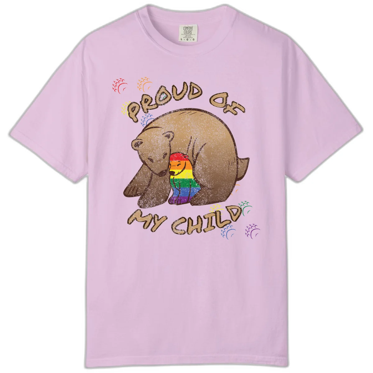 Brown bear proudly displaying rainbow pride colors with 'Proud As Shit' text and decorative bursts in Orchid