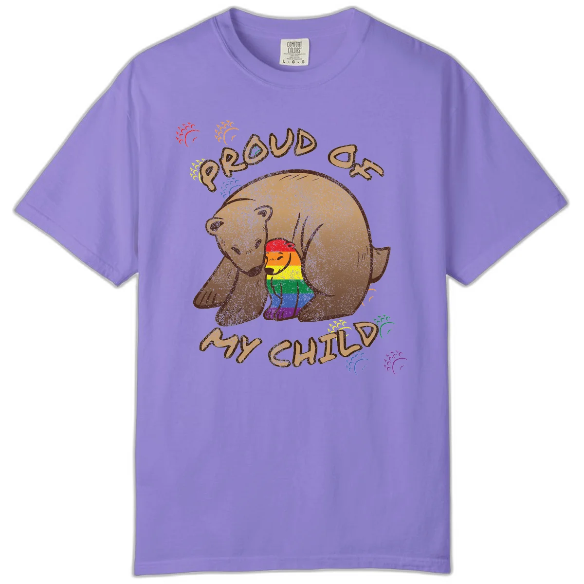 Brown bear proudly displaying rainbow pride colors with 'Proud As Shit' text and decorative bursts in Violet