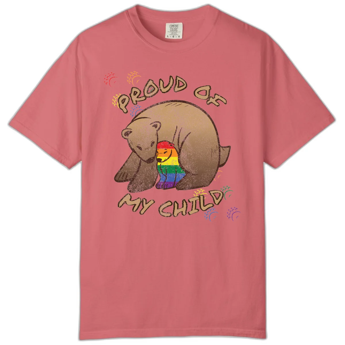 Brown bear proudly displaying rainbow pride colors with 'Proud As Shit' text and decorative bursts in Watermelon