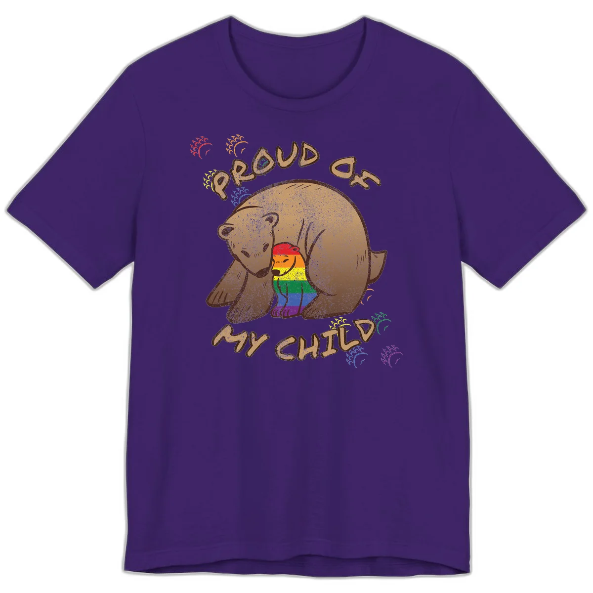 Brown bear proudly displaying rainbow pride colors with 'Proud As Shit' text and decorative bursts in Team Purple