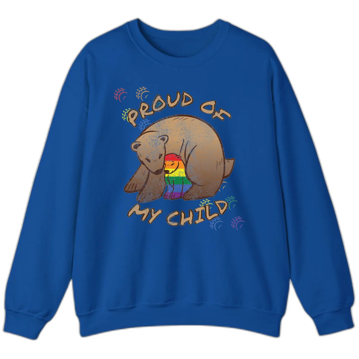 Brown bear proudly displaying rainbow pride colors with 'Proud As Shit' text and decorative bursts in Royal