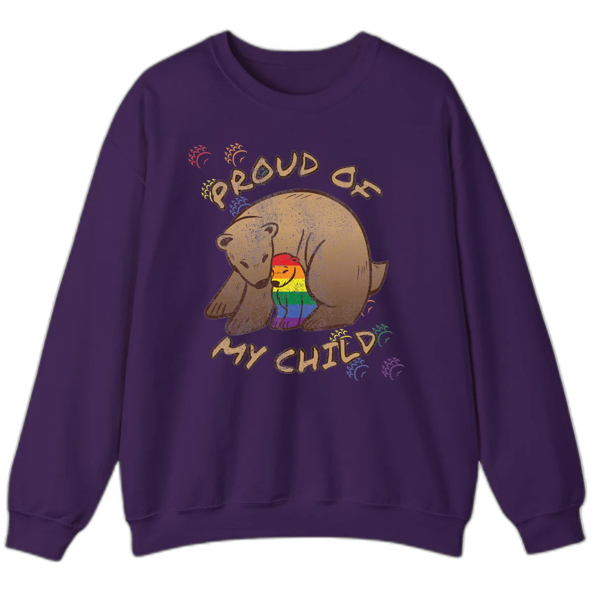 Brown bear proudly displaying rainbow pride colors with 'Proud As Shit' text and decorative bursts in Purple