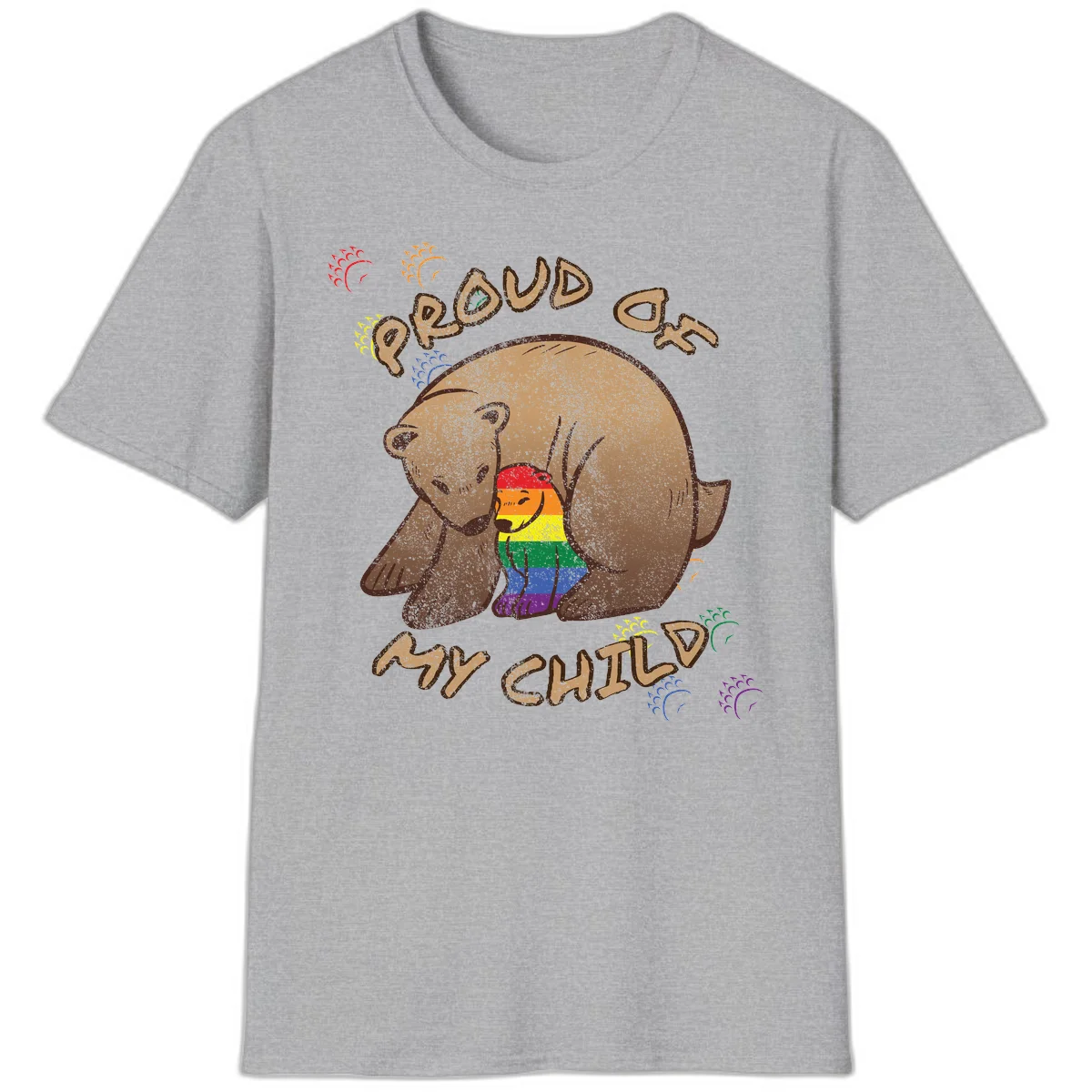 Brown bear proudly displaying rainbow pride colors with 'Proud As Shit' text and decorative bursts in Sport Grey