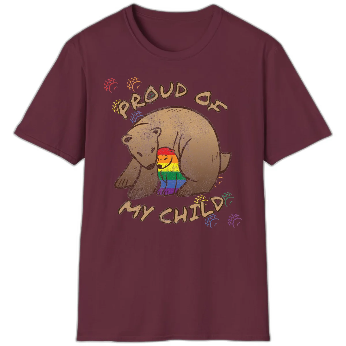 Brown bear proudly displaying rainbow pride colors with 'Proud As Shit' text and decorative bursts in Maroon
