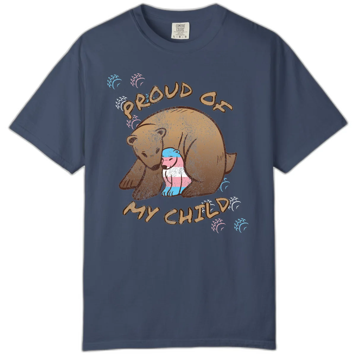 Brown bear holding a cub with blue, pink and white stripes, surrounded by 'Proud As My Chubby' text and decorative wave designs celebrating transgender pride in Midnight