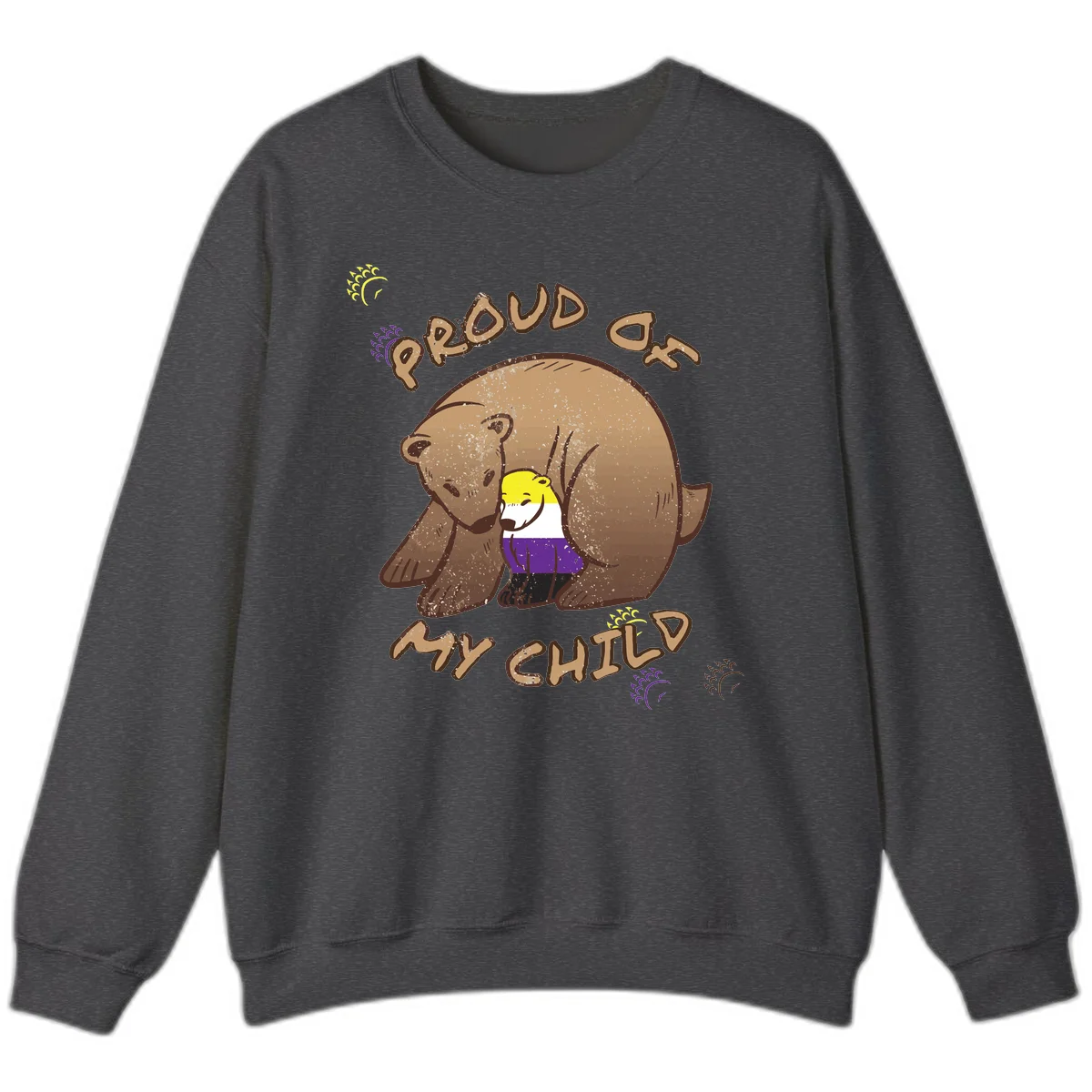 Illustration of a large brown bear's head in profile containing a small figure wearing pride flag colors, with text reading 'Proud As Child' in Dark Heather