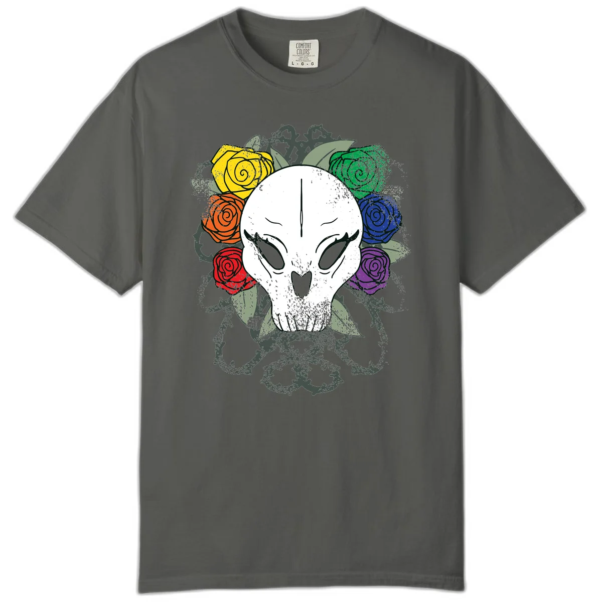 White skull with rainbow colored roses in yellow, orange, red, blue, green, and purple surrounding it on gray background in Pepper