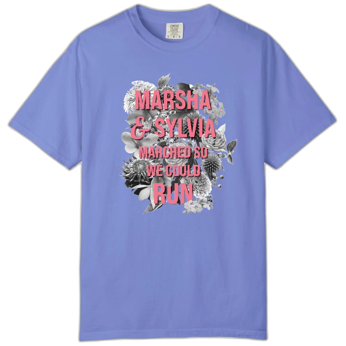 Pink text reading 'Marsha & Sylvia Marched So We Could Run' overlaid on black and white floral arrangement with roses and dahlias in Flo Blue