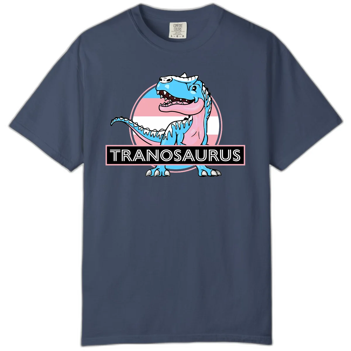 Blue cartoon T-Rex dinosaur with open mouth against pink and white pride flag circular background, labeled Tranosaurus in Midnight