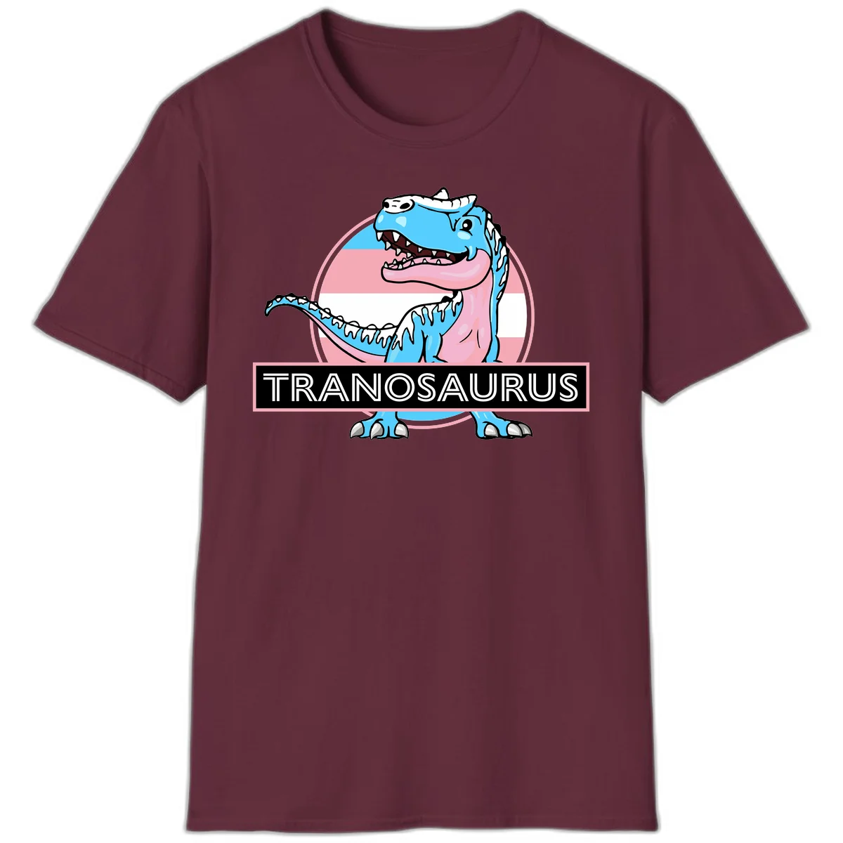 Blue cartoon T-Rex dinosaur with open mouth against pink and white pride flag circular background, labeled Tranosaurus in Maroon