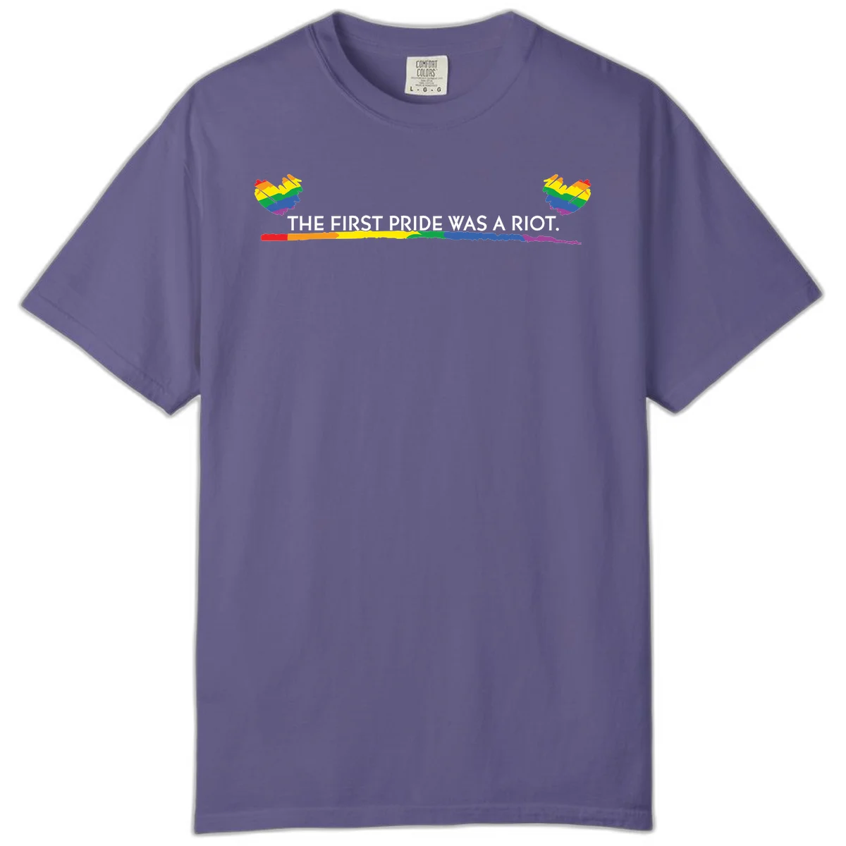 Gray background with white text reading 'THE FIRST PRIDE WAS A RIOT' surrounded by rainbow pride hearts and gradient stripe in Grape