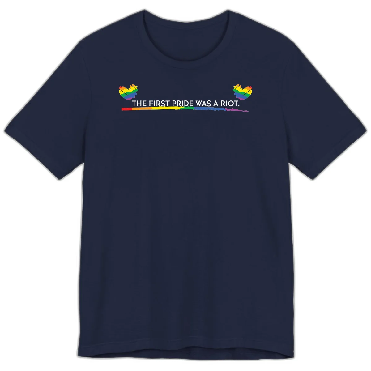 Gray background with white text reading 'THE FIRST PRIDE WAS A RIOT' surrounded by rainbow pride hearts and gradient stripe in Navy