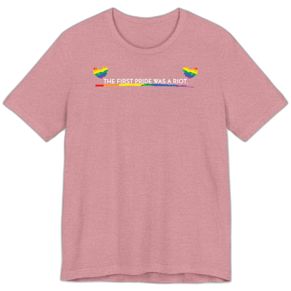 Gray background with white text reading 'THE FIRST PRIDE WAS A RIOT' surrounded by rainbow pride hearts and gradient stripe in Heather Orchid