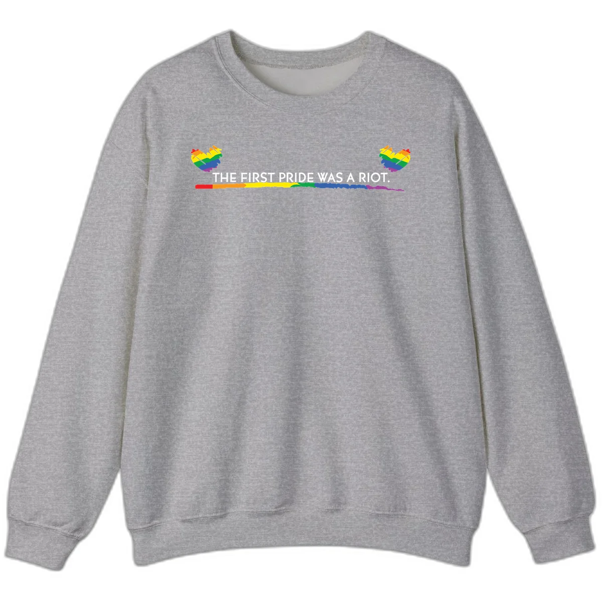 Gray background with white text reading 'THE FIRST PRIDE WAS A RIOT' surrounded by rainbow pride hearts and gradient stripe in Sport Grey