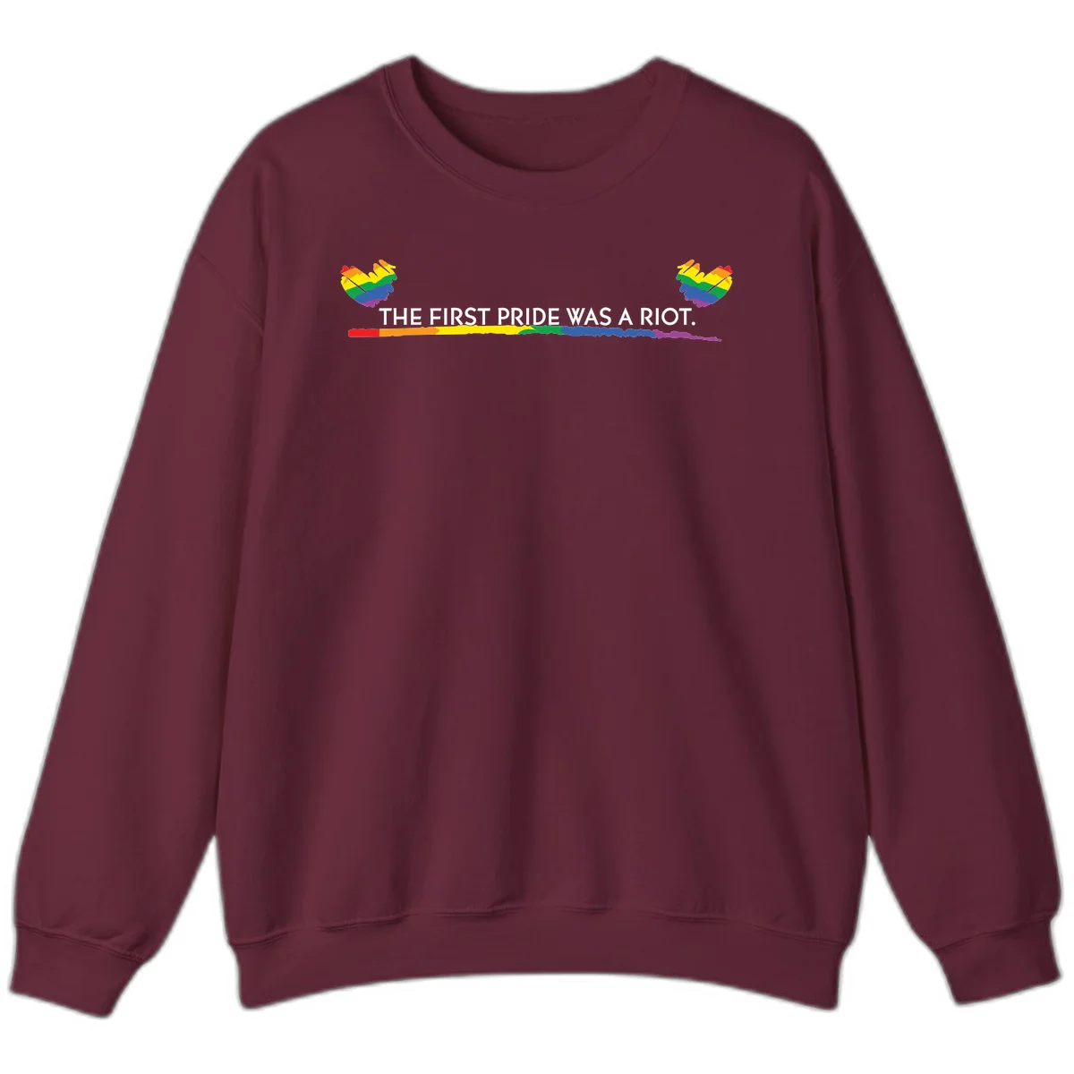 Gray background with white text reading 'THE FIRST PRIDE WAS A RIOT' surrounded by rainbow pride hearts and gradient stripe in Maroon
