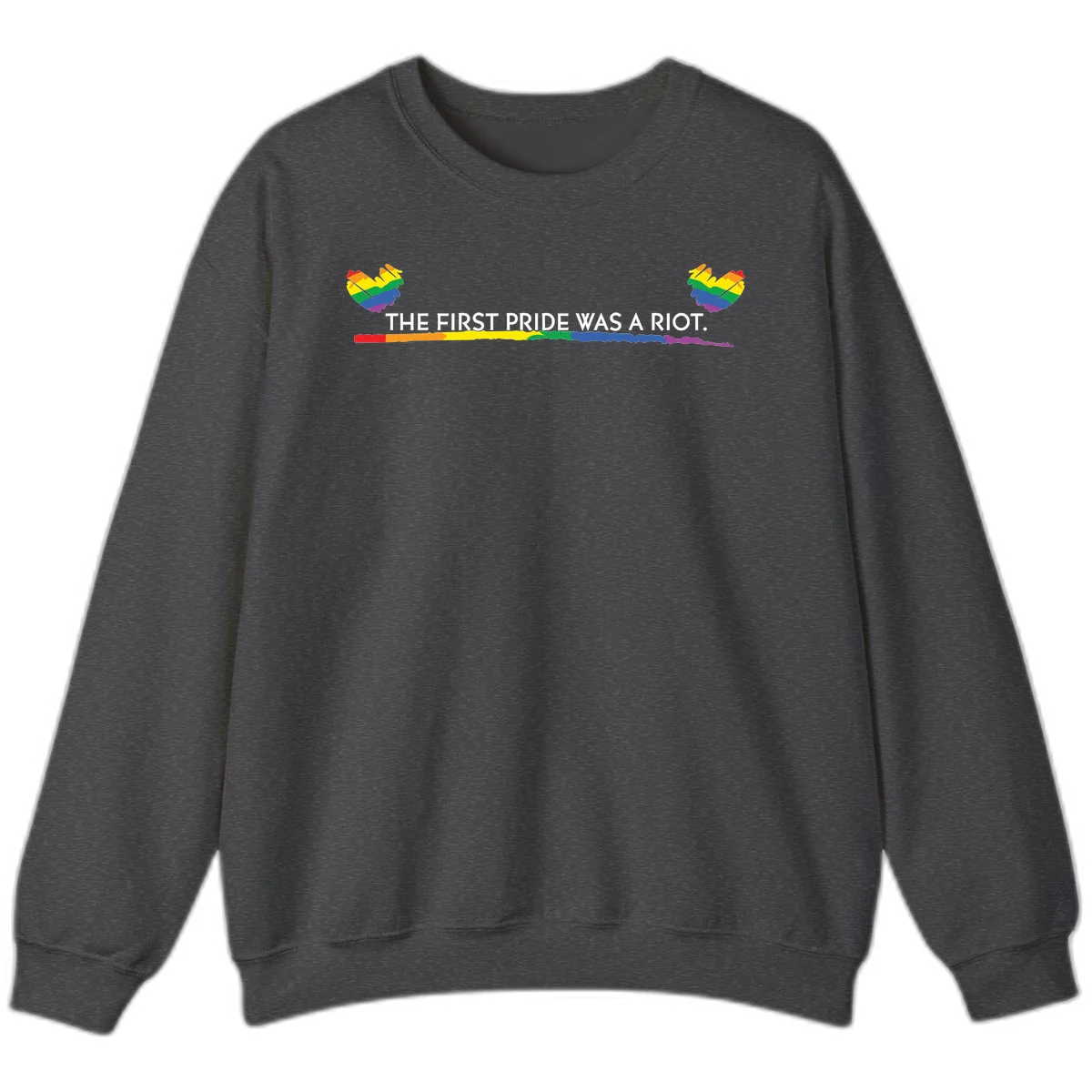 Gray background with white text reading 'THE FIRST PRIDE WAS A RIOT' surrounded by rainbow pride hearts and gradient stripe in Dark Heather