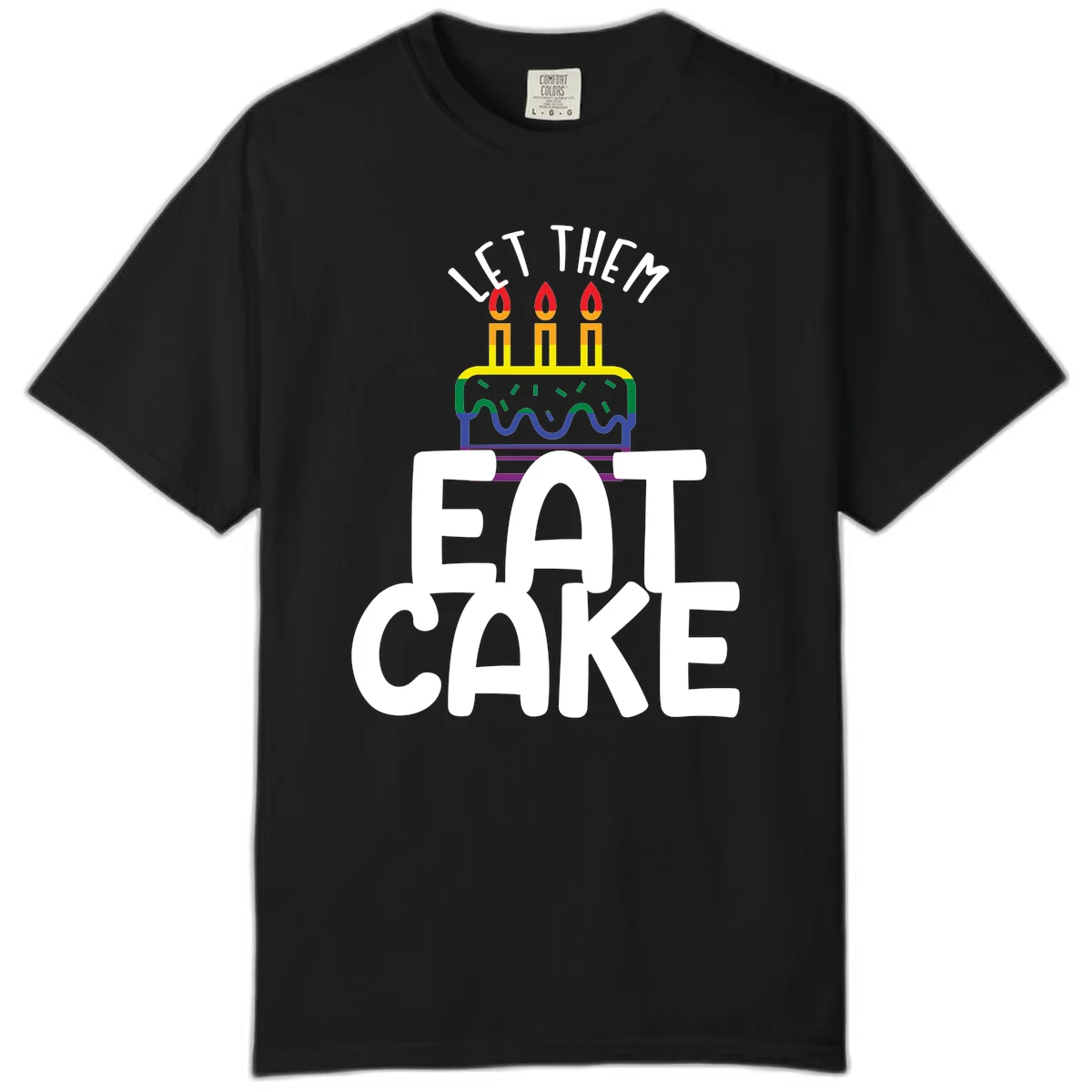 Rainbow-layered birthday cake with three candles above bold white text reading 'Let Them Eat Cake' - a Pride-themed design in Black