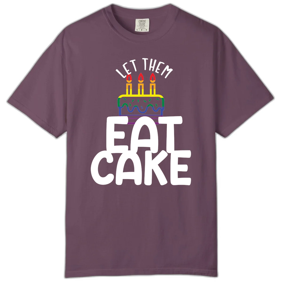 Rainbow-layered birthday cake with three candles above bold white text reading 'Let Them Eat Cake' - a Pride-themed design in Berry