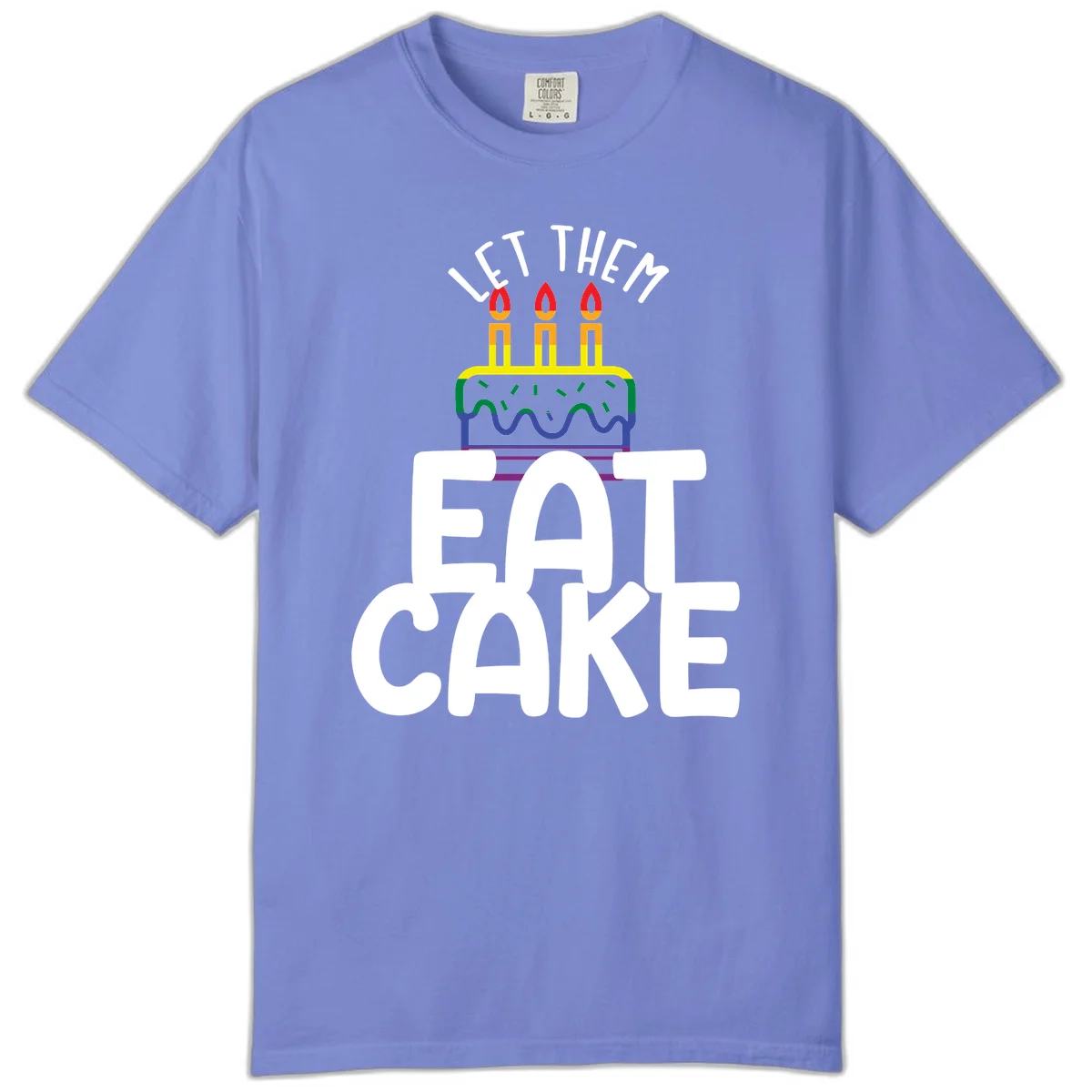 Rainbow-layered birthday cake with three candles above bold white text reading 'Let Them Eat Cake' - a Pride-themed design in Flo Blue