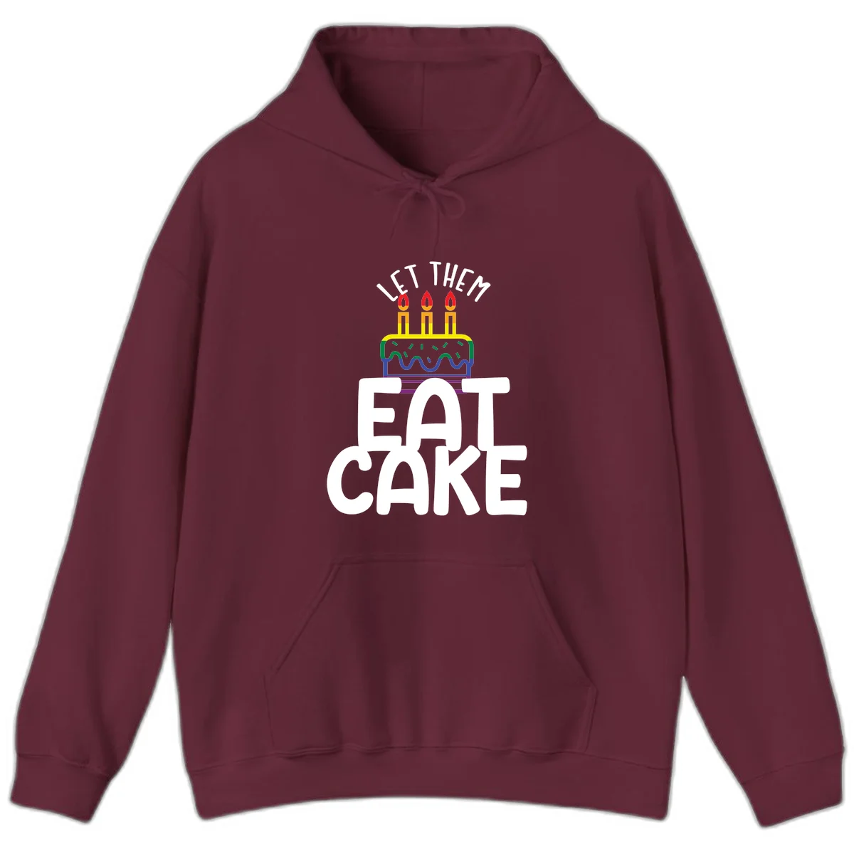 Rainbow-layered birthday cake with three candles above bold white text reading 'Let Them Eat Cake' - a Pride-themed design in Maroon