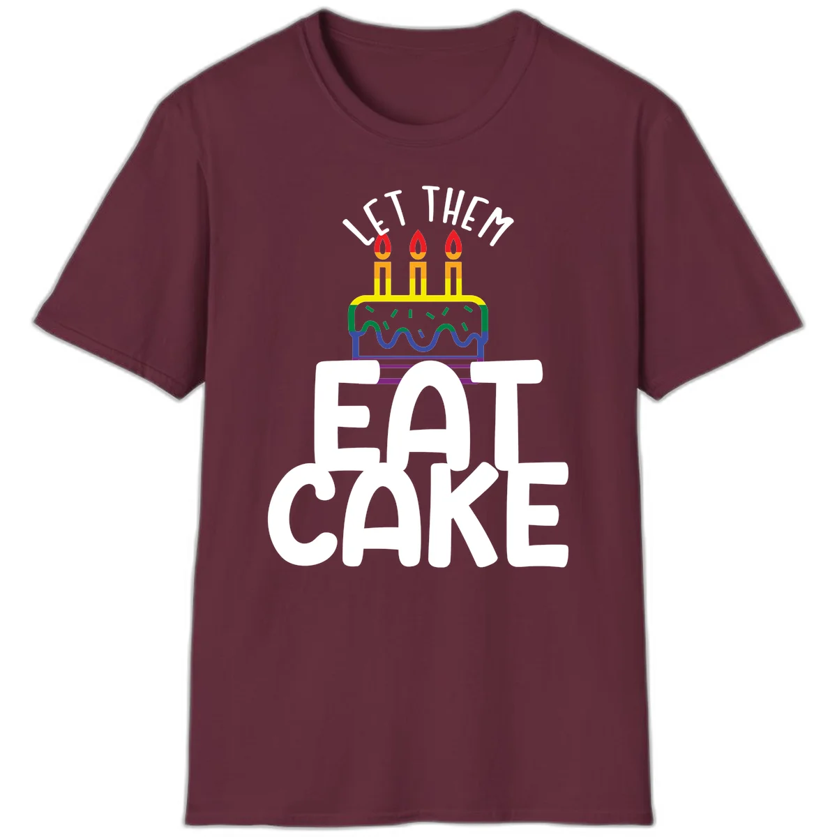 Rainbow-layered birthday cake with three candles above bold white text reading 'Let Them Eat Cake' - a Pride-themed design in Maroon