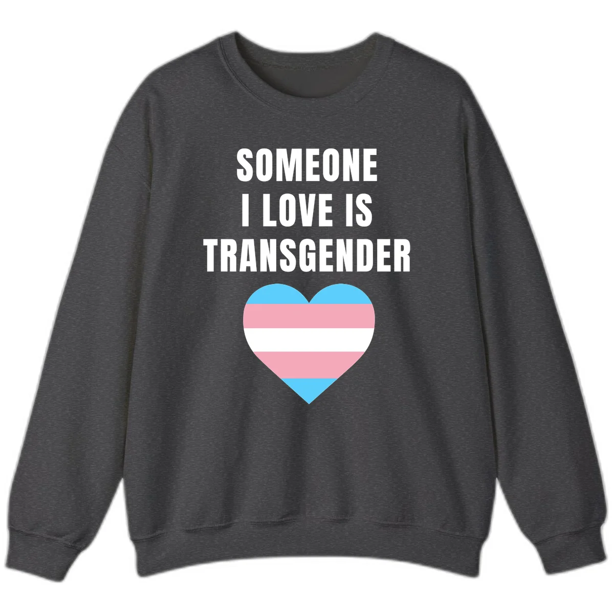 Gray background with white text reading 'Someone I Love Is Transgender' above a heart featuring blue, pink, and white transgender flag stripes in Dark Heather