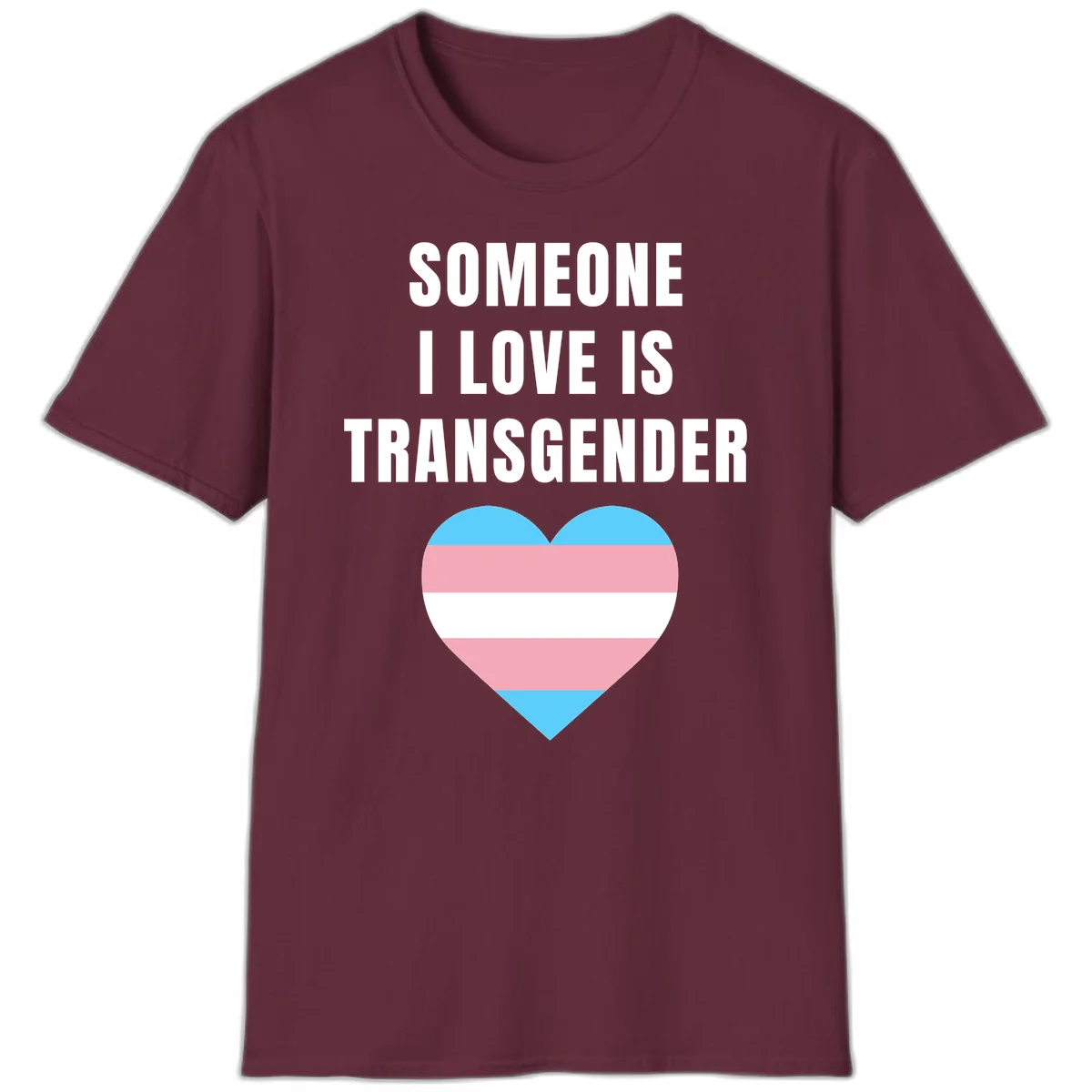 Gray background with white text reading 'Someone I Love Is Transgender' above a heart featuring blue, pink, and white transgender flag stripes in Maroon