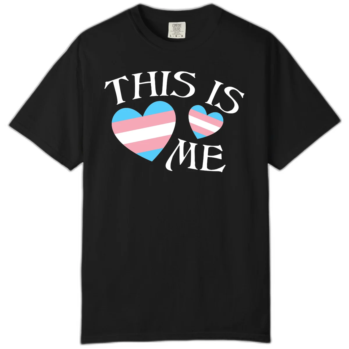 Two striped hearts in trans flag colors (blue, pink, white) with 'THIS IS ME' text celebrating trans pride and identity in Black