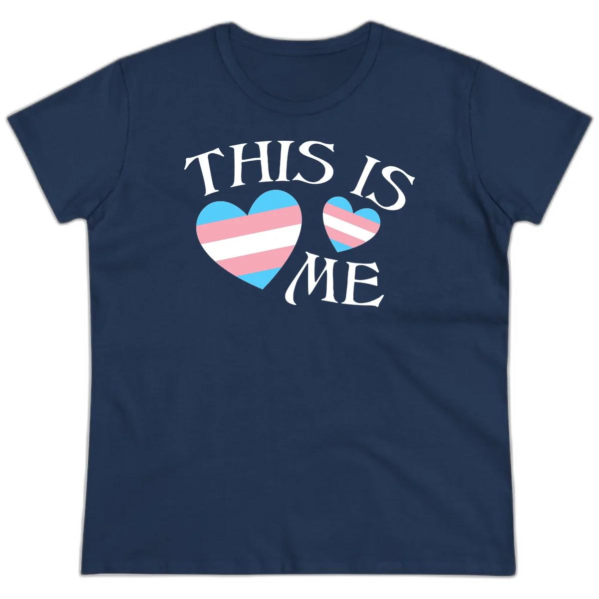 Two striped hearts in trans flag colors (blue, pink, white) with 'THIS IS ME' text celebrating trans pride and identity in Navy