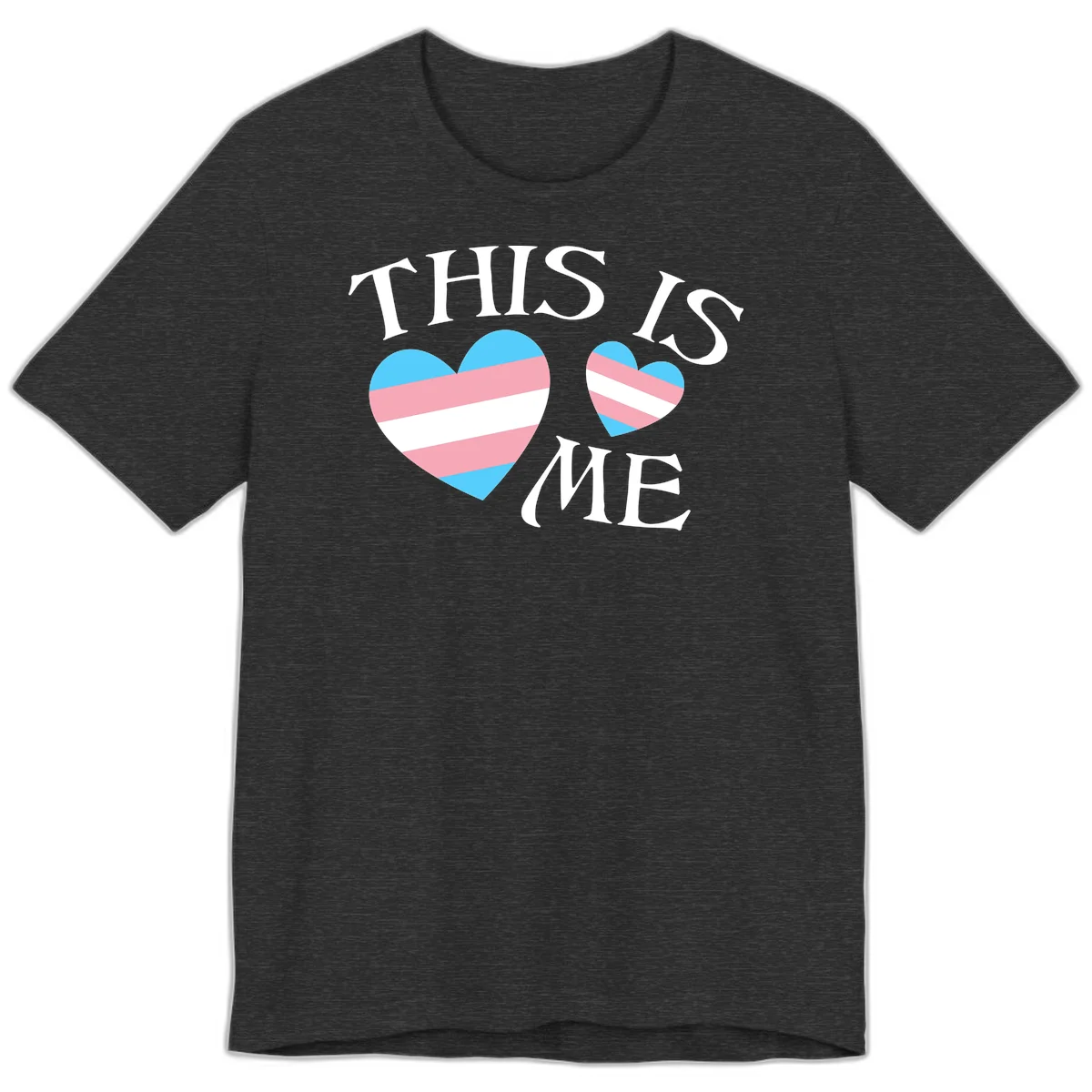 Two striped hearts in trans flag colors (blue, pink, white) with 'THIS IS ME' text celebrating trans pride and identity in Dark Grey Heather