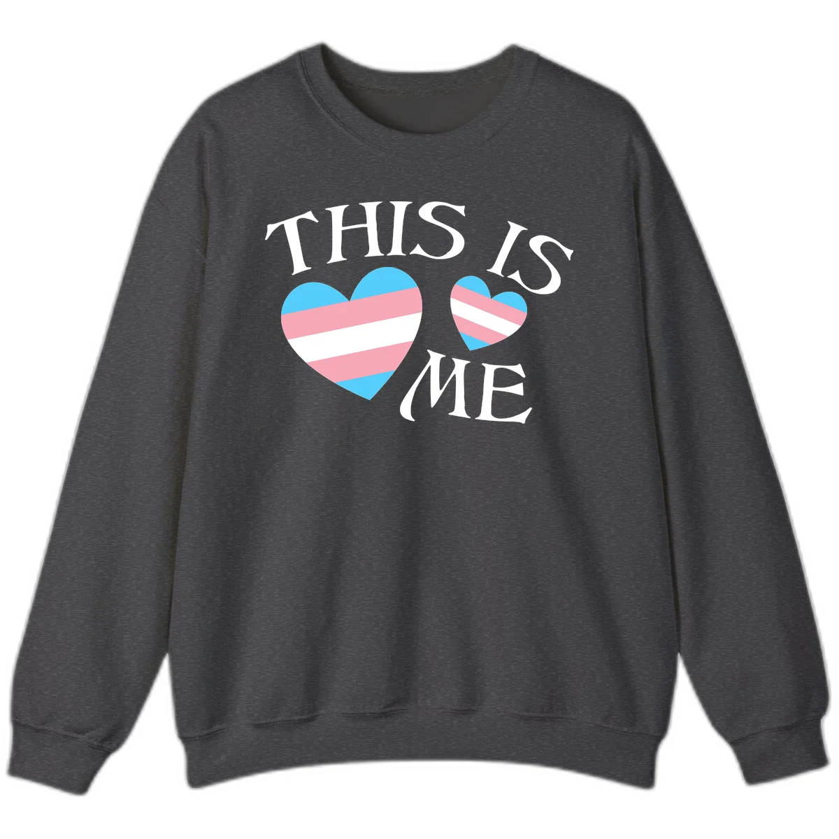 Two striped hearts in trans flag colors (blue, pink, white) with 'THIS IS ME' text celebrating trans pride and identity in Dark Heather