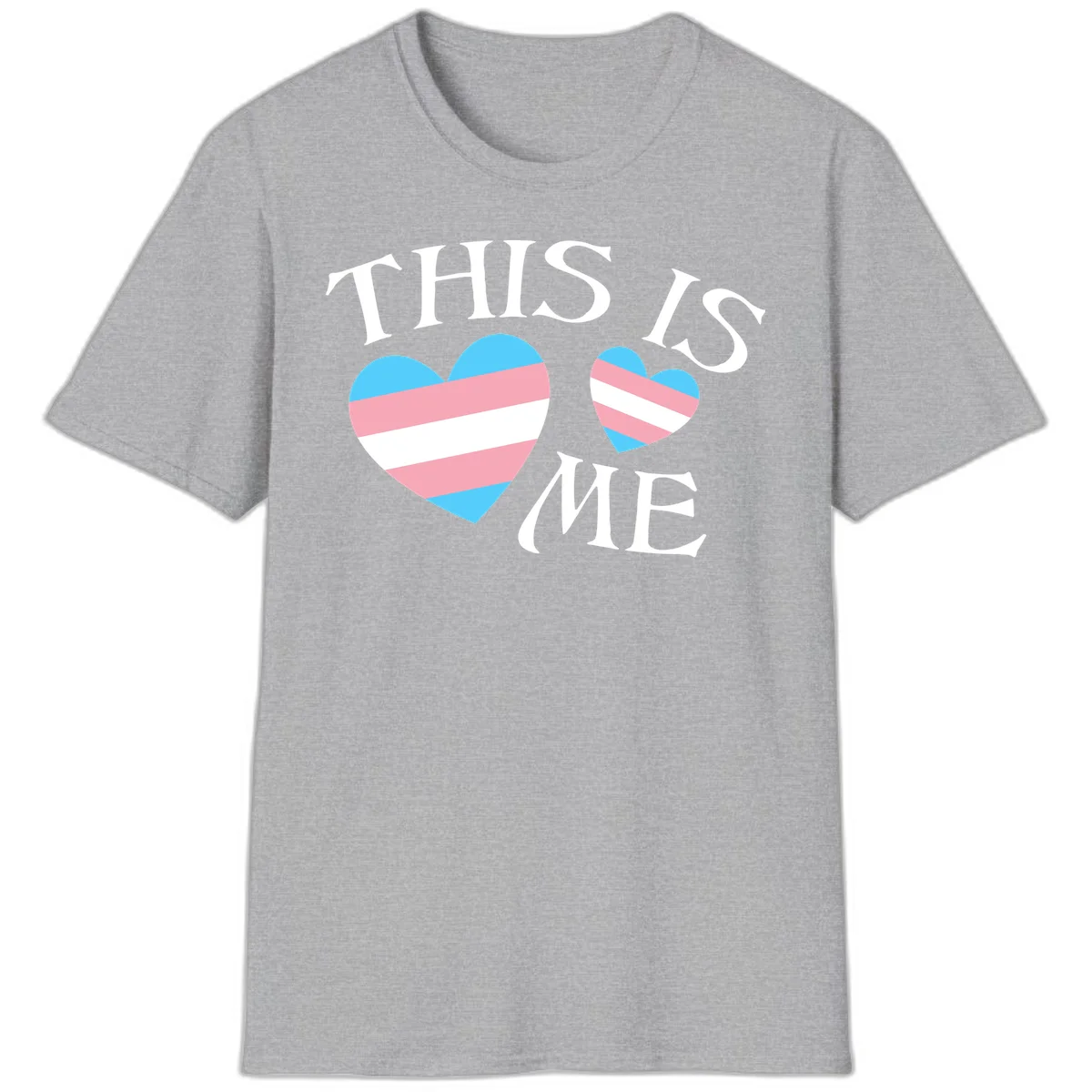 Two striped hearts in trans flag colors (blue, pink, white) with 'THIS IS ME' text celebrating trans pride and identity in Sport Grey